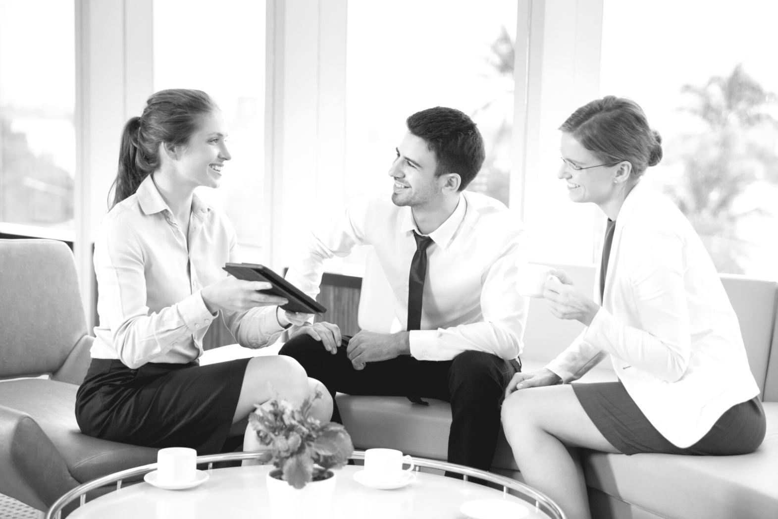 Person reviewing financial documents with mobile banking app
