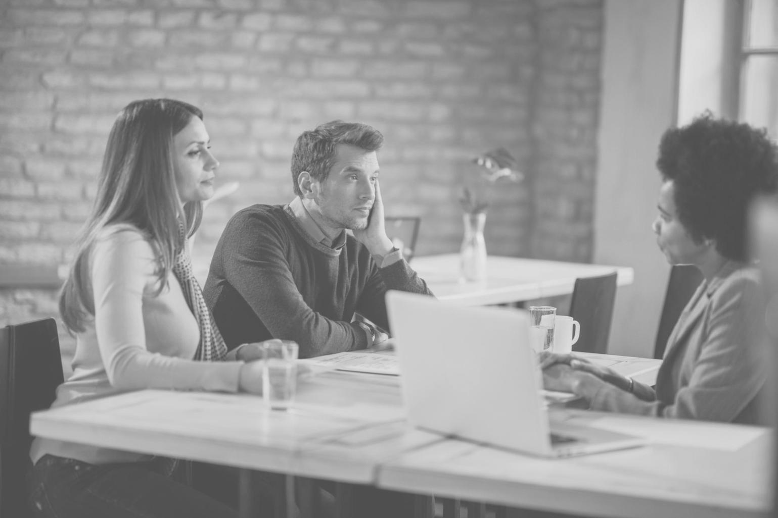 Professional consultation session showing collaborative financial planning discussion